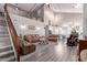 Spacious living room has lots of natural light with open staircase and views of the kitchen at 29756 N Varnum Rd, San Tan Valley, AZ 85143