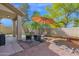 Inviting backyard with patio, fire pit, and seating area, perfect for outdoor entertaining at 30430 N 42Nd Pl, Cave Creek, AZ 85331