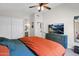 Spacious bedroom boasts ceiling fan, tv, and access to the en-suite bathroom at 30430 N 42Nd Pl, Cave Creek, AZ 85331