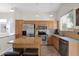 Bright kitchen with stainless steel appliances, granite countertops, and ample cabinet space at 30430 N 42Nd Pl, Cave Creek, AZ 85331