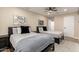 Bedroom with two beds, ceiling fan, and gray patterned bedding with black accents at 3209 E Marilyn Rd, Phoenix, AZ 85032