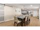 Open dining room with table for six that transitions seamlessly to the kitchen at 3209 E Marilyn Rd, Phoenix, AZ 85032