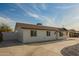 Attractive single-story home featuring a well-kept lawn and clean exterior at 3209 E Marilyn Rd, Phoenix, AZ 85032