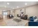 Bright and airy living room featuring modern furnishings and neutral color palette at 3209 E Marilyn Rd, Phoenix, AZ 85032