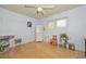 Bright and airy bedroom with hardwood floors and ample natural light from the windows at 3328 S Stanley Pl, Tempe, AZ 85282