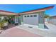 Attached garage with convenient access to the home and patio area, plus extra parking space at 3328 S Stanley Pl, Tempe, AZ 85282