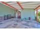 Charming covered patio area with cozy seating and vibrant decor welcomes outdoor relaxation and entertainment at 3328 S Stanley Pl, Tempe, AZ 85282