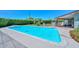 Large backyard swimming pool and patio with well maintained landscaping at 3328 S Stanley Pl, Tempe, AZ 85282