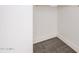 Spacious walk-in pantry with tile flooring, baseboards, and white walls at 3591 S Ranger Trl, Gilbert, AZ 85297