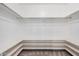 Walk-in closet featuring built-in shelving and ample storage space at 3591 S Ranger Trl, Gilbert, AZ 85297
