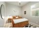 Inviting bedroom featuring stylish decor, a ceiling fan, and a cozy bed at 3918 E Arabian Dr, Gilbert, AZ 85296