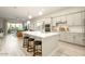 Spacious kitchen with stainless steel appliances, a center island with bar seating, and an open layout at 3918 E Arabian Dr, Gilbert, AZ 85296