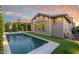 Inviting pool with sleek lounge chairs and lush greenery, perfect for relaxation and enjoying outdoor living at 3918 E Arabian Dr, Gilbert, AZ 85296