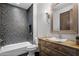 Bathroom features a vanity with vessel sink, shower with tile surround, and modern fixtures at 3980 E Sierra Vista Dr, Paradise Valley, AZ 85253