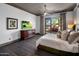Spacious bedroom features a covered patio with serene views and modern furnishings at 3980 E Sierra Vista Dr, Paradise Valley, AZ 85253