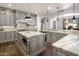 Elegant kitchen with marble countertops, gray cabinetry, and pendant lighting at 3980 E Sierra Vista Dr, Paradise Valley, AZ 85253