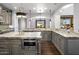 Gourmet kitchen featuring granite countertops, stainless steel appliances, and custom cabinets at 3980 E Sierra Vista Dr, Paradise Valley, AZ 85253