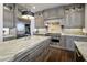 Beautiful kitchen with a large island, custom cabinetry, and stainless steel appliances at 3980 E Sierra Vista Dr, Paradise Valley, AZ 85253