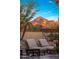 Patio with lounge chairs and views of a mountain in the distance at 3980 E Sierra Vista Dr, Paradise Valley, AZ 85253