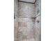 Modern shower features decorative tile, stone accents, and a rainfall shower head at 3980 E Sierra Vista Dr, Paradise Valley, AZ 85253