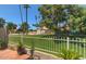 Lush backyard featuring a pool, privacy fence, and mature landscaping at 4020 E Laurel Ln, Phoenix, AZ 85028
