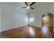 Spacious bedroom with natural light, hardwood floors and fan at 4020 E Laurel Ln, Phoenix, AZ 85028