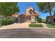 Charming two-story home with a well-maintained lawn and a two-car garage, blending comfort with curb appeal at 4020 E Laurel Ln, Phoenix, AZ 85028