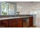 Kitchen area featuring updated countertops and stainless steel appliances at 4020 E Laurel Ln, Phoenix, AZ 85028