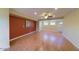 Spacious living room features hardwood floors, recessed lights and fan at 4020 E Laurel Ln, Phoenix, AZ 85028