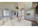 Bright and airy living room with vaulted ceilings and elegant chandelier at 4020 E Laurel Ln, Phoenix, AZ 85028