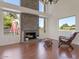 Cozy living room featuring a fireplace, comfortable seating, and plenty of natural light at 4020 E Laurel Ln, Phoenix, AZ 85028