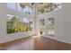 Bright living room with large windows and doors, letting in plenty of natural light at 4020 E Laurel Ln, Phoenix, AZ 85028