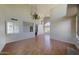 Large living room with hardwood floors, high ceilings, and ample space for entertaining at 4020 E Laurel Ln, Phoenix, AZ 85028