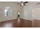 Bright main bedroom with wood floors and closet at 4020 E Laurel Ln, Phoenix, AZ 85028