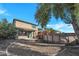 Expansive backyard featuring an above ground pool, gravel landscaping, and privacy fencing at 41369 W Parkhill Dr, Maricopa, AZ 85138