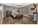This bedroom features an elegant ceiling fan, stylish furniture, and ample natural light at 41369 W Parkhill Dr, Maricopa, AZ 85138