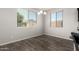 The dining area is well lit from the natural light let in by two large windows at 4253 E Palo Verde St, Gilbert, AZ 85296