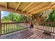 Backyard deck features a rustic outdoor heater and a wooden railing at 4332 W Monte Cristo W Ave, Glendale, AZ 85306