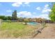 Expansive backyard featuring a pool, patio, and ample green space at 4332 W Monte Cristo W Ave, Glendale, AZ 85306