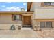 Close-up showcasing the beautiful wood front door, brickwork, and well-kept exterior at 4332 W Monte Cristo W Ave, Glendale, AZ 85306