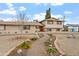 Charming two-story home featuring a stone pathway, landscaped front yard, and a mix of brick and stucco siding at 4332 W Monte Cristo W Ave, Glendale, AZ 85306