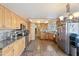 Spacious kitchen with stainless steel appliances, ample counter space, and tile flooring at 4332 W Monte Cristo W Ave, Glendale, AZ 85306