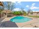 Backyard view of the private pool with a covered patio area, perfect for relaxation and outdoor entertaining at 4332 W Monte Cristo W Ave, Glendale, AZ 85306