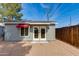 Exterior shot of backyard and detached unit with gravel flooring at 4440 E Campbell Ave, Phoenix, AZ 85018