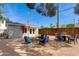 Serene backyard featuring comfortable seating, pea gravel, and a well-maintained exterior, perfect for relaxing at 4440 E Campbell Ave, Phoenix, AZ 85018
