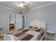 Comfortable bedroom with neutral paint, ceiling fan, and closet at 4440 E Campbell Ave, Phoenix, AZ 85018