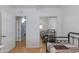 Bright bedroom featuring mirrored closet doors, natural light, and neutral decor at 4440 E Campbell Ave, Phoenix, AZ 85018