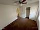 Bedroom featuring carpet flooring, a ceiling fan, and a closet at 46037 W Starlight Dr, Maricopa, AZ 85139