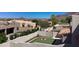 Private backyard oasis with a putting green, golf course views, and a mature desert landscape at 6144 S Fairway Pl, Gold Canyon, AZ 85118
