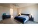 This large bedroom features carpet, recessed lighting, ceiling fan and closet space at 6144 S Fairway Pl, Gold Canyon, AZ 85118